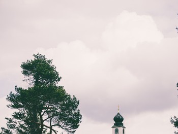 A beautiful small catholic church in the mountains of the Bavarian Alps